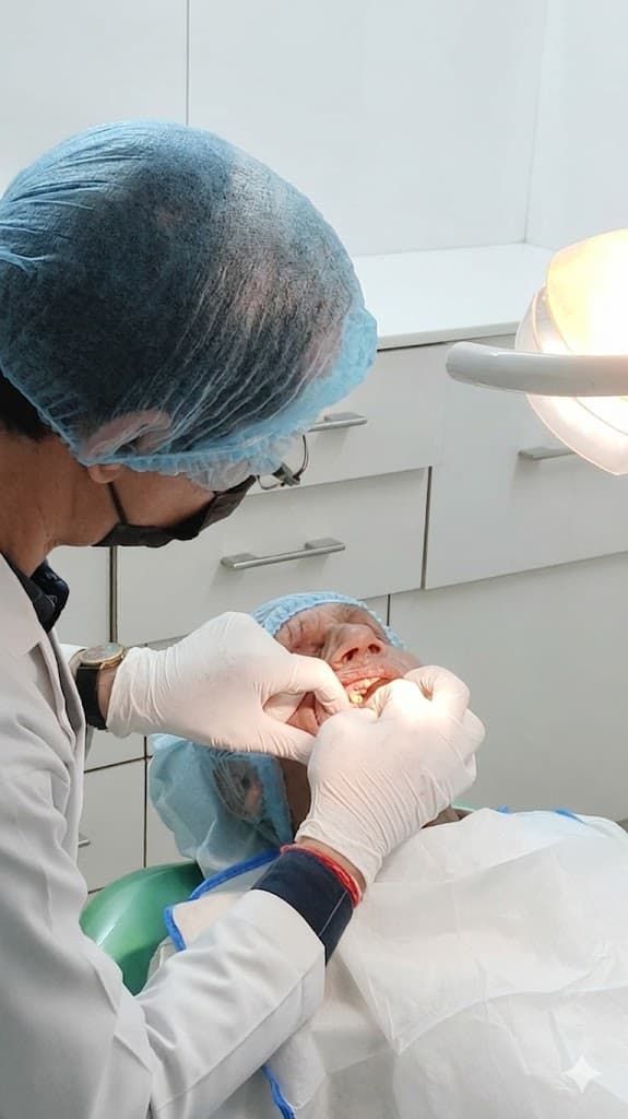 Doctor attending a patient at Wadhwa Dental Clinic